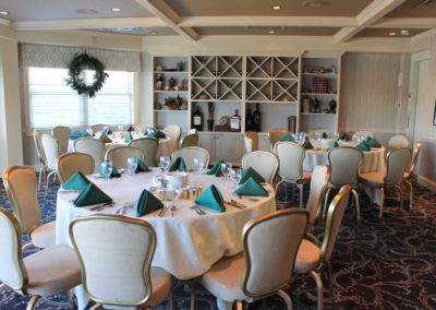 Reserve Room holiday setup with three round tables.